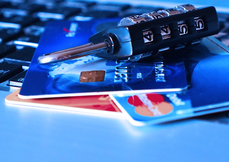 padlock on top of personal cards